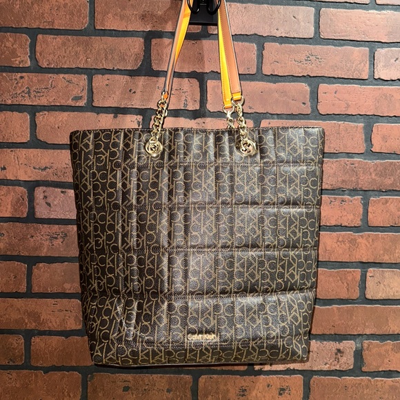 Calvin Klein Handbags - Calvin Klein Brown Monogram Quilted Tote with Yellow Trim